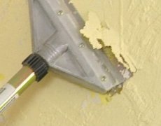 Как убрать старую краску со стены?